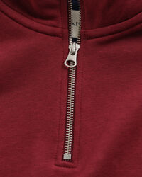 Felpa Shield con zip corta