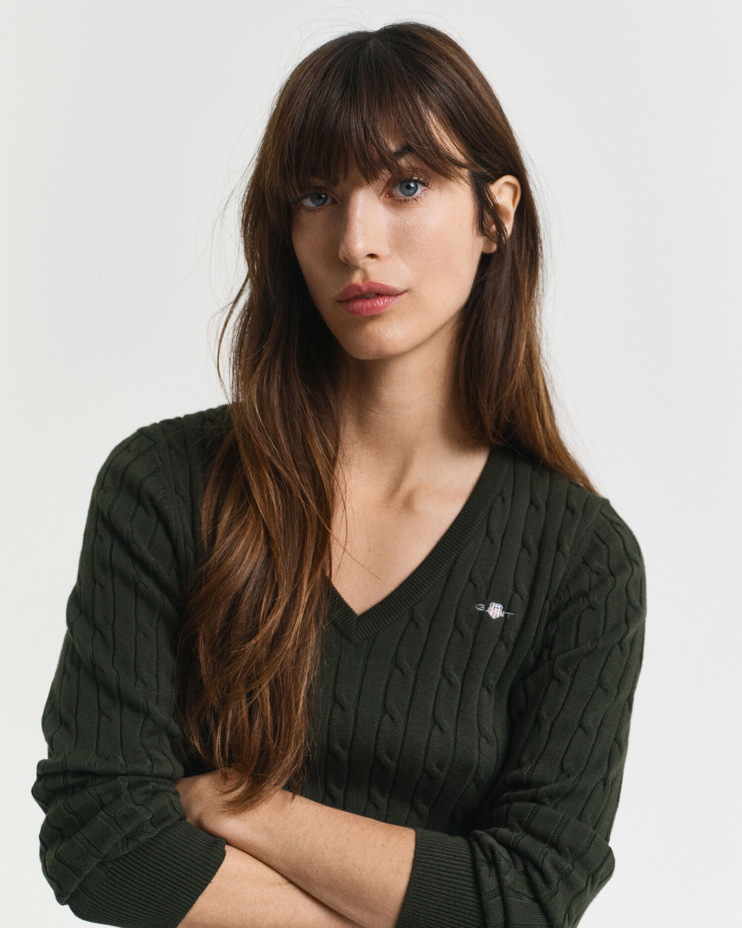 Maglia con scollo a V in cotone elasticizzato a trecce