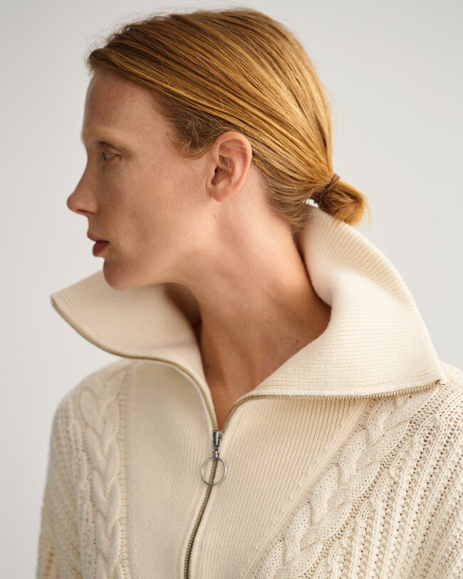 Maglia a trecce con zip corta