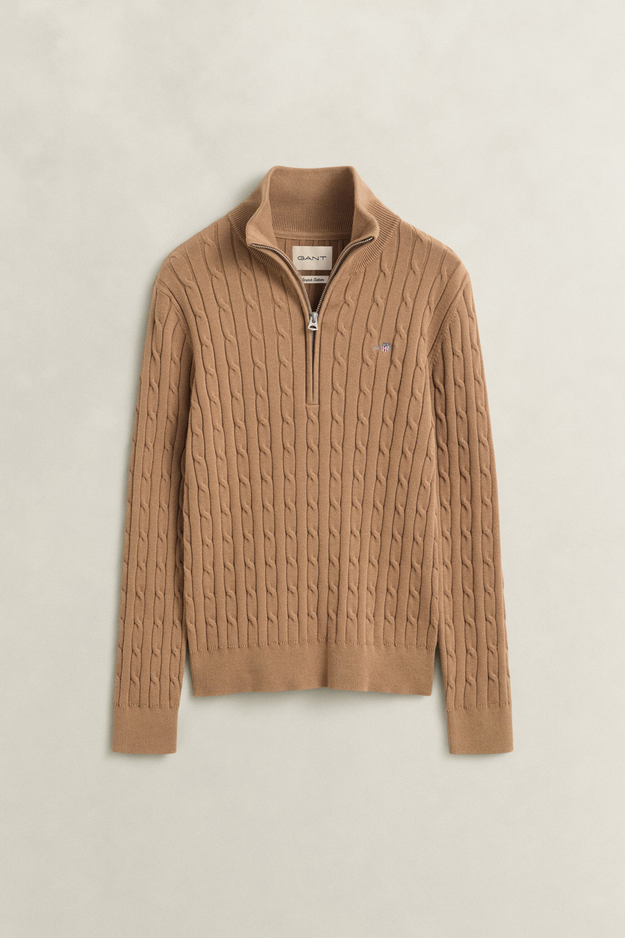 Maglia con zip corta elasticizzata a trecce