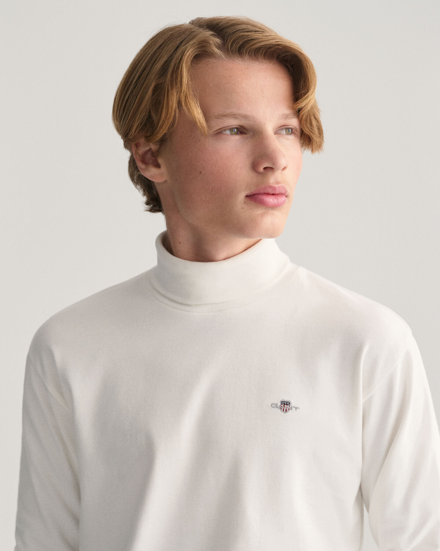 Top a maniche lunghe a collo alto Shield Teens