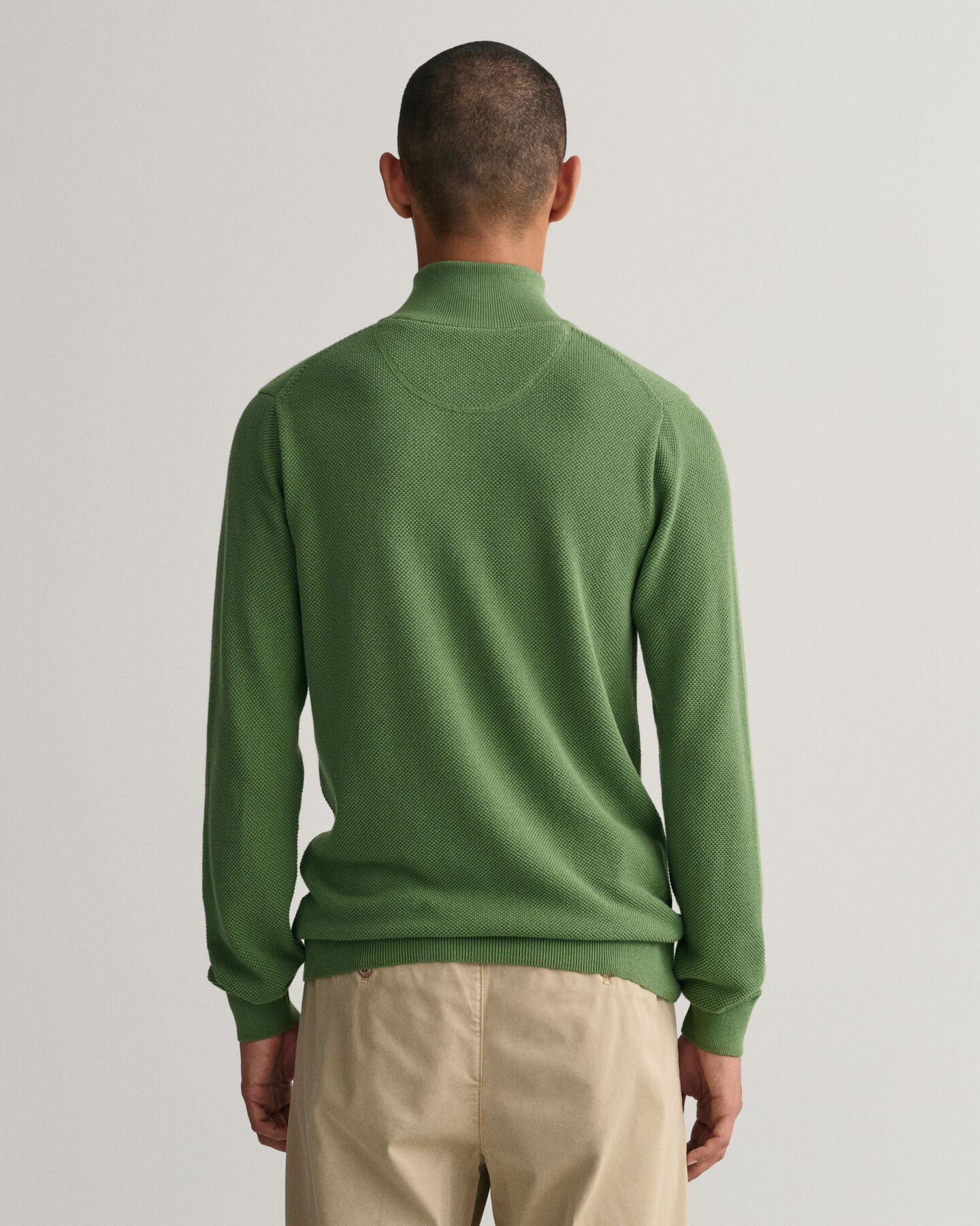 Maglia in piqu&eacute; di cotone con zip corta