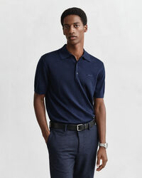 Polo a maniche corte realizzata in pregiata lana merino