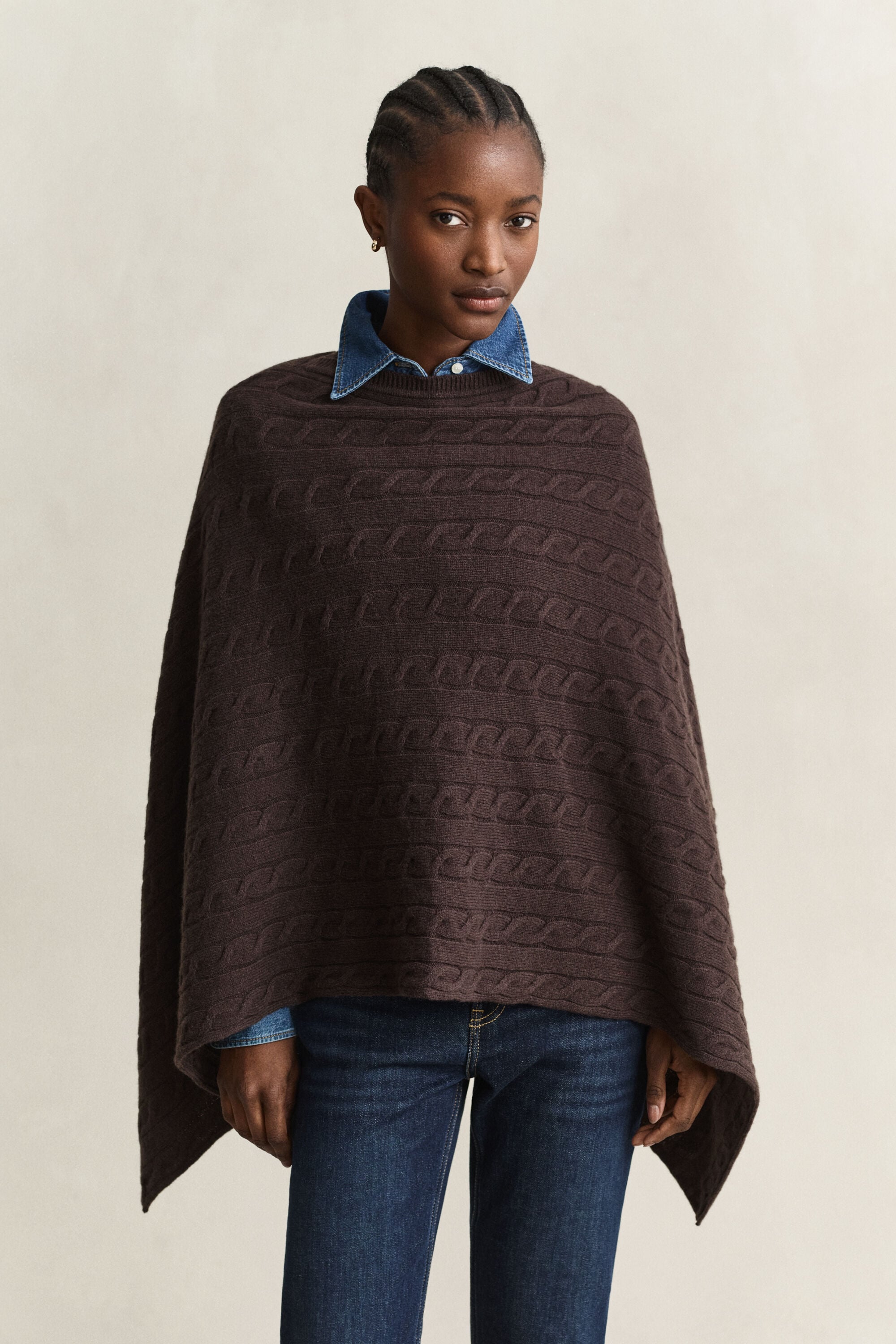 Poncho a trecce in lana