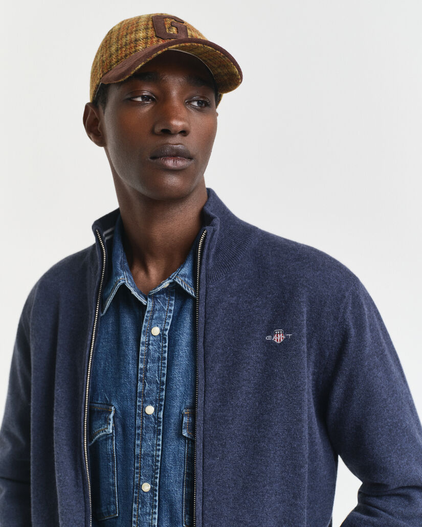 Cardigan con zip in finissima lana d’agnello