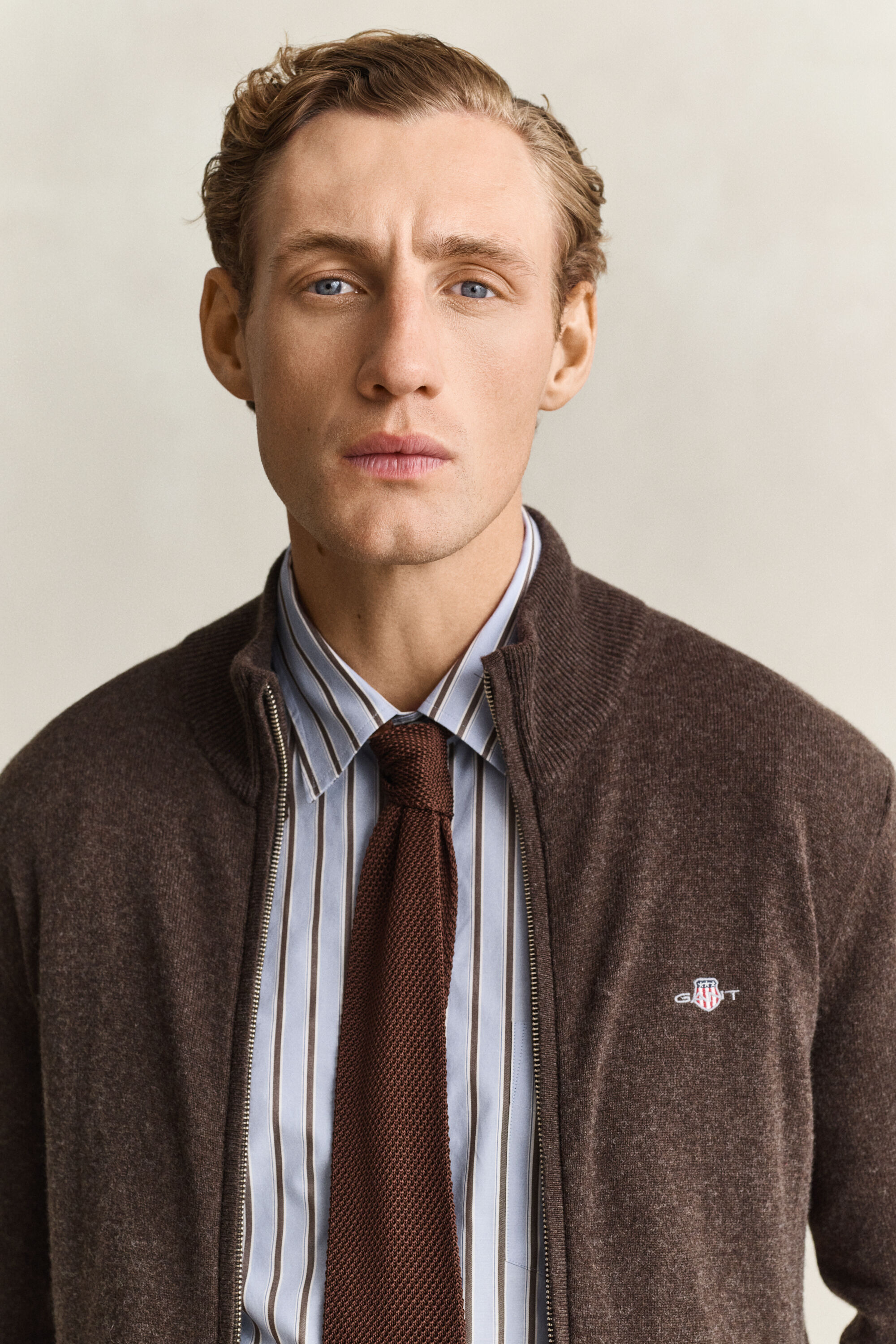 Cardigan con zip in lana d’agnello
