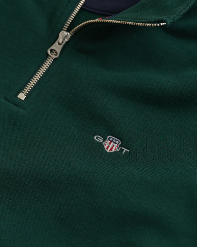 Felpa Shield con zip corta