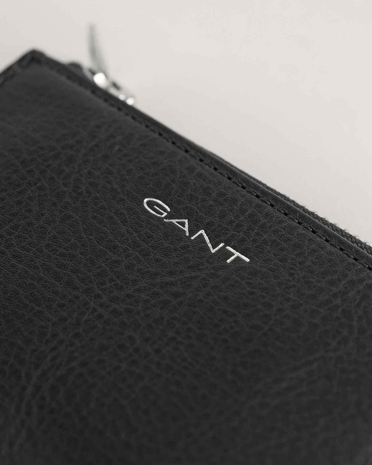 Pochette in pelle con zip