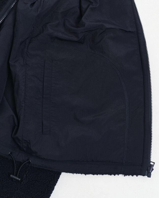 Pile double-face con zip