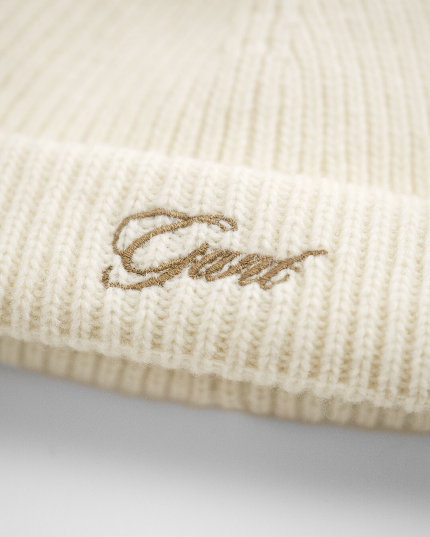 Berretto con pompon e paraorecchie Baby