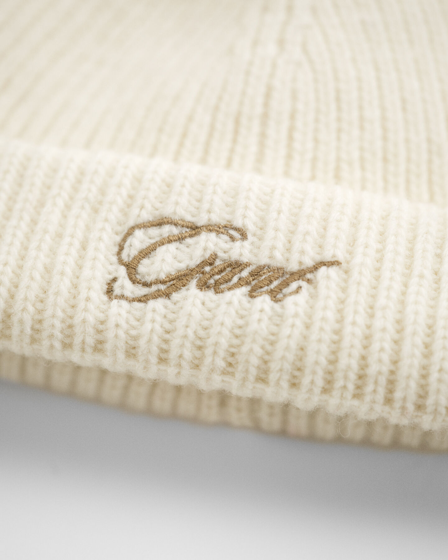 Berretto con pompon e paraorecchie Baby