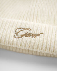 Berretto con pompon e paraorecchie Baby