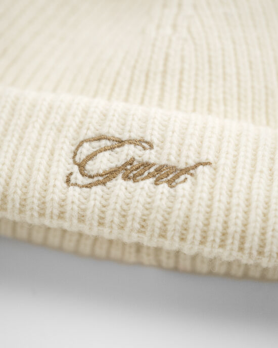 Berretto con pompon e paraorecchie Baby