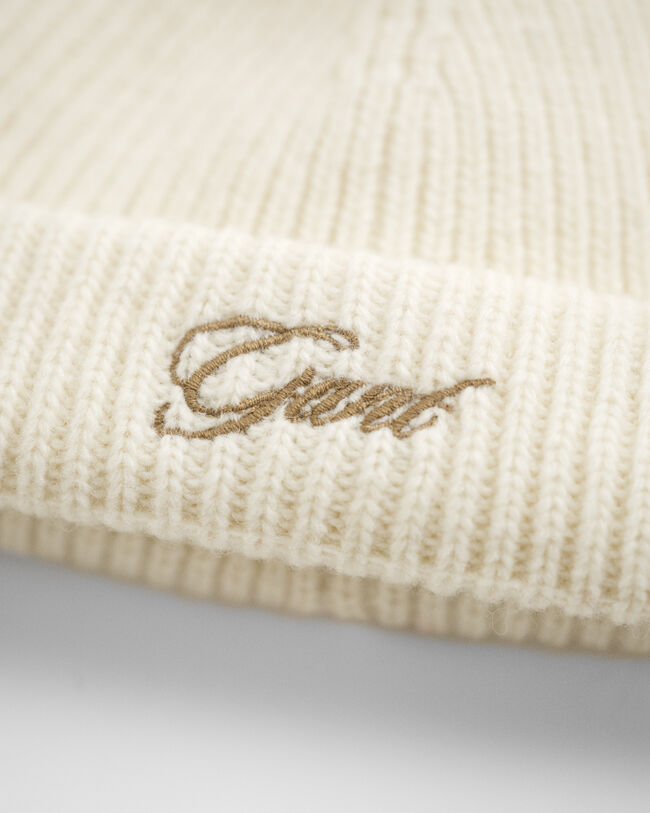 Berretto con pompon e paraorecchie Baby