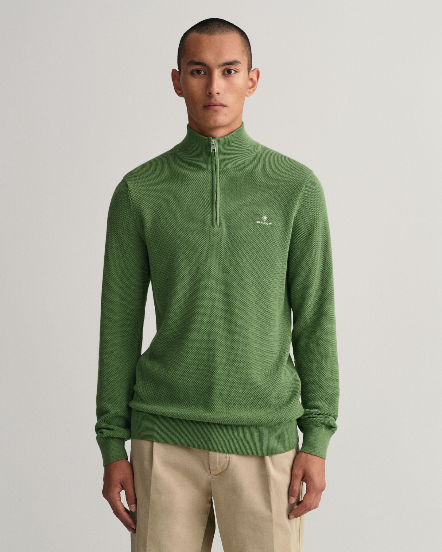 Maglia in piqu&eacute; di cotone con zip corta