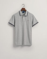 Polo in piqu&eacute; con bordino a spina di pesce