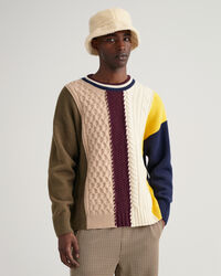 Maglia girocollo in cotone con patchwork di trecce