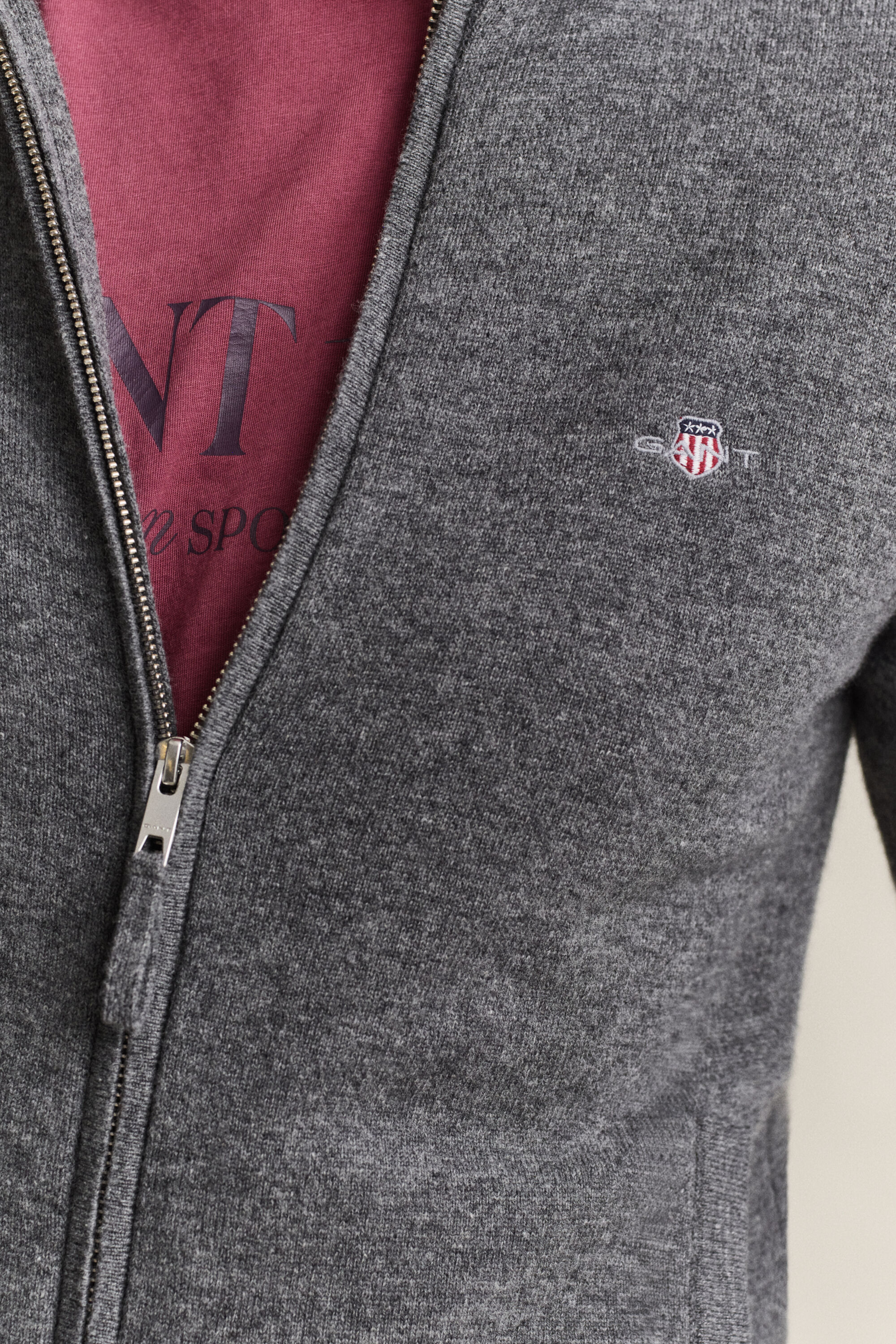 Cardigan con zip in lana d’agnello
