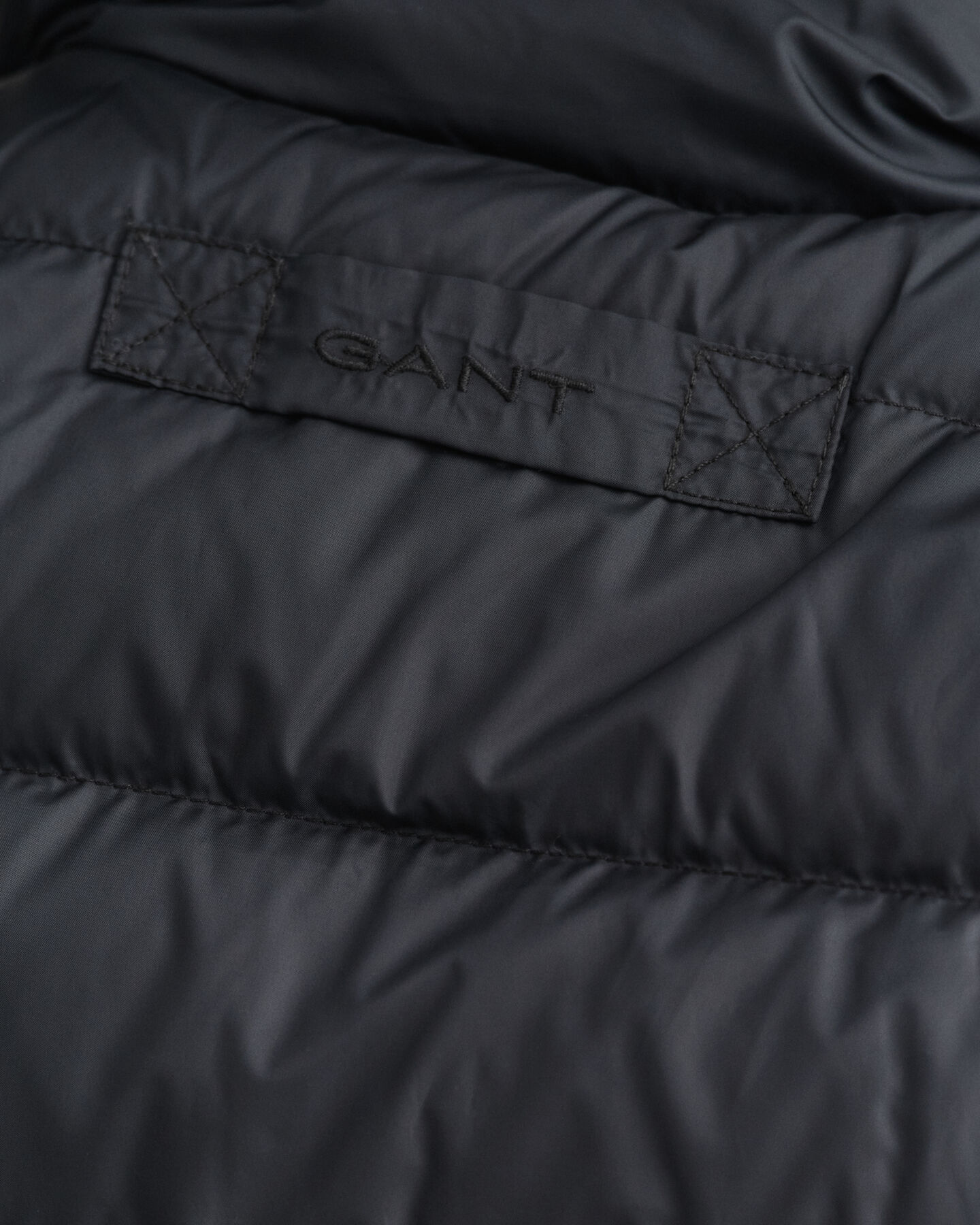 Piumino smanicato leggero