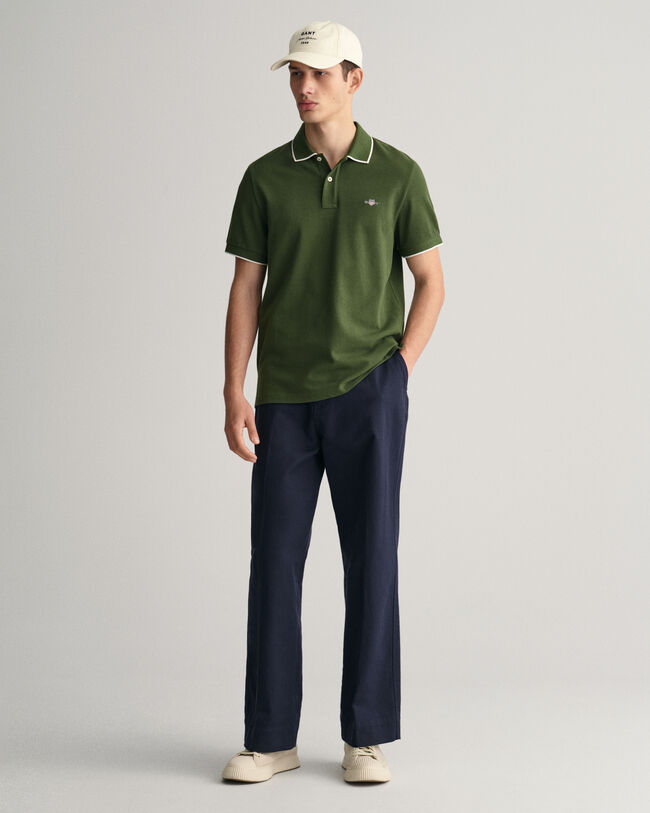 Polo in piqu&eacute; con bordino a contrasto