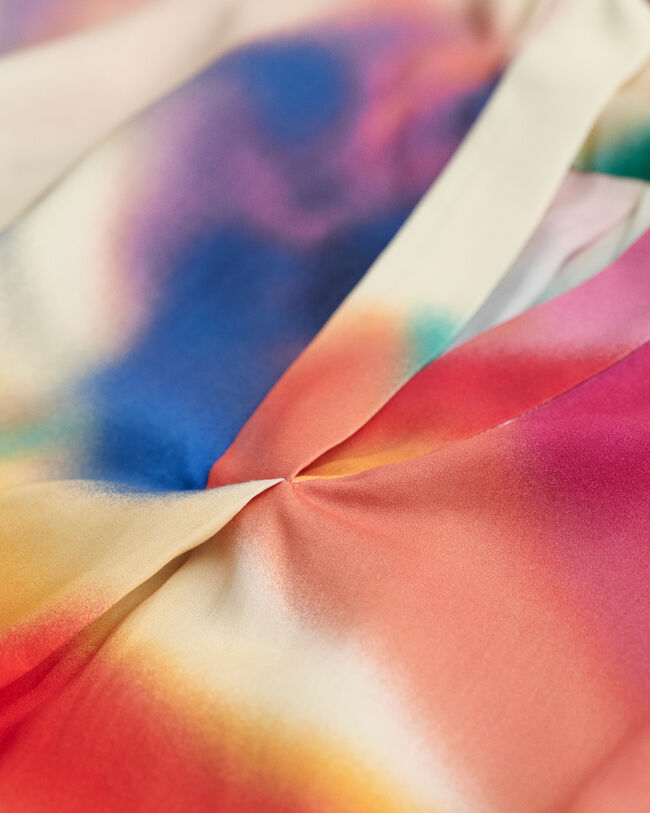 Blusa smanicata con stampa floreale