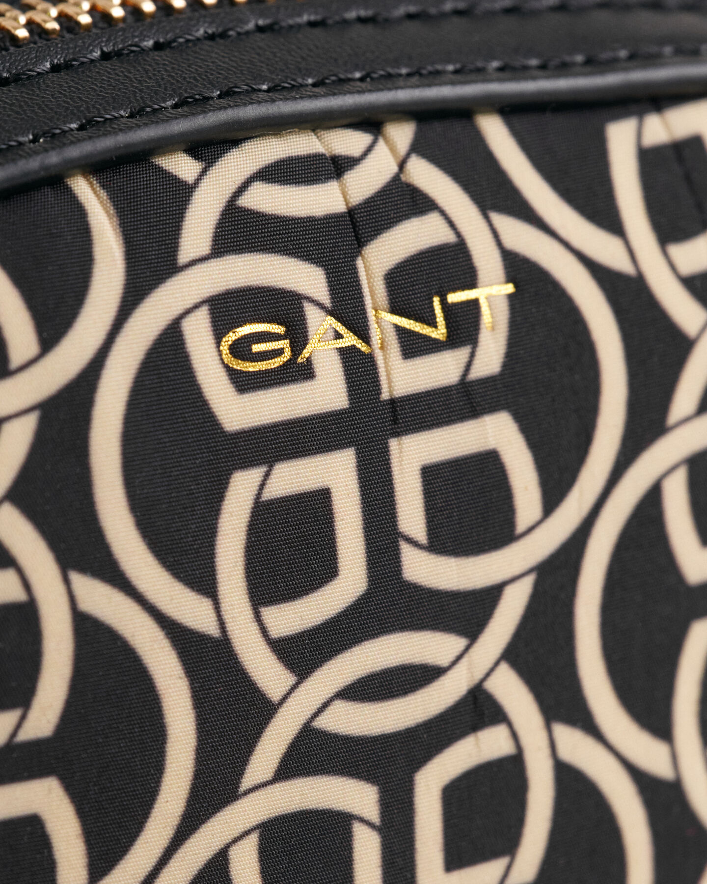 Trousse in pelle con motivo G