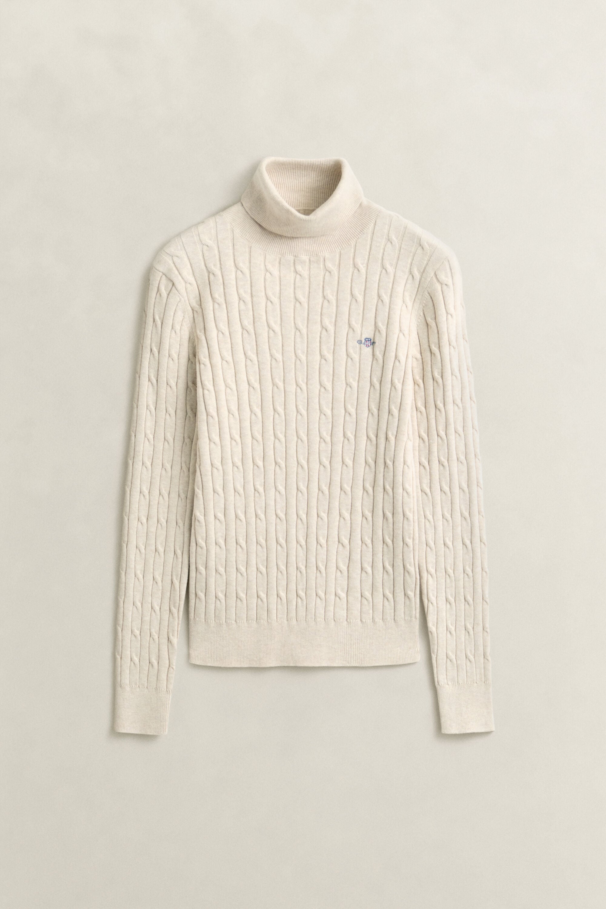Maglia a collo alto in cotone elasticizzato a trecce