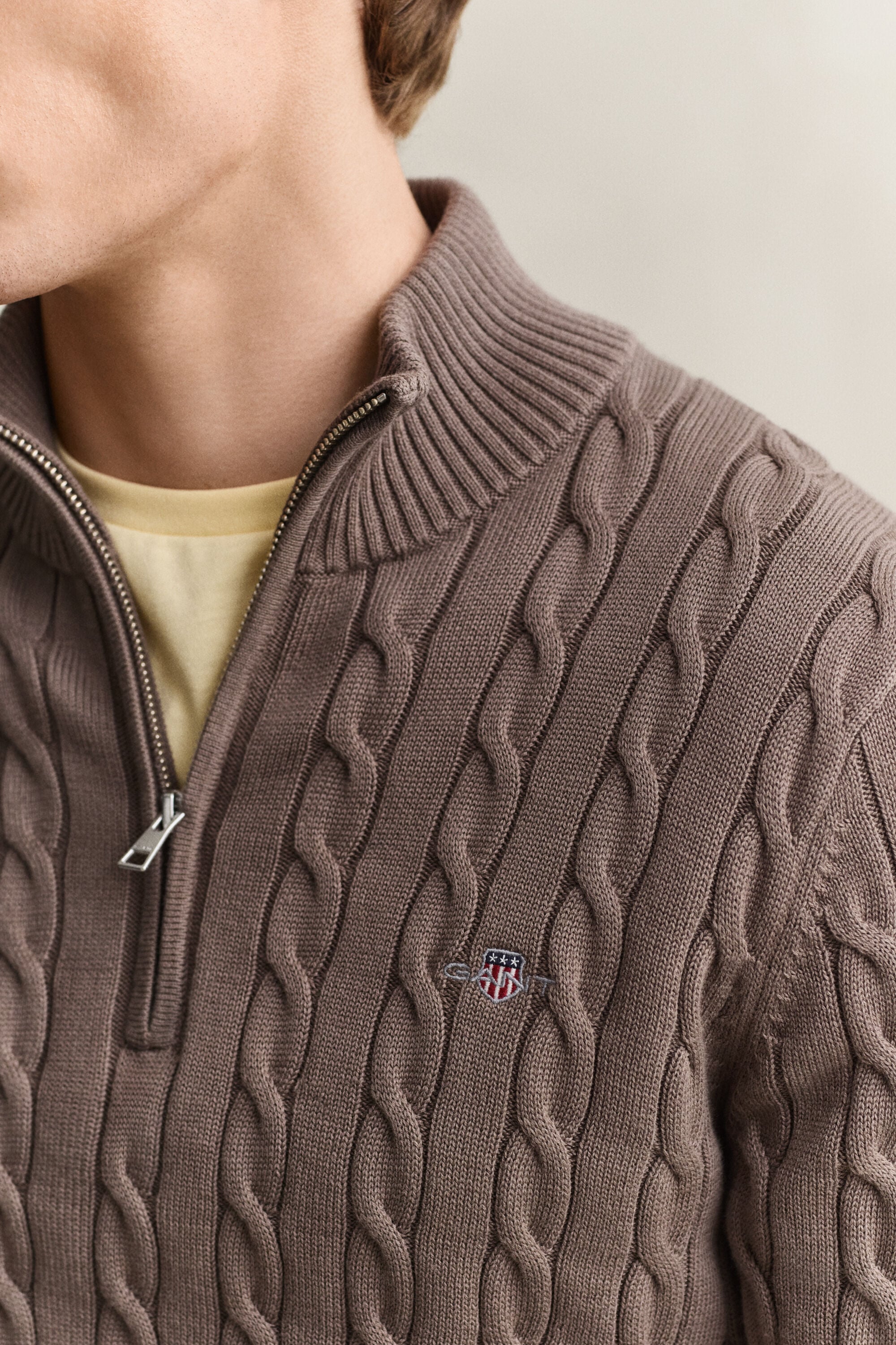 Maglia con zip corta in cotone a trecce