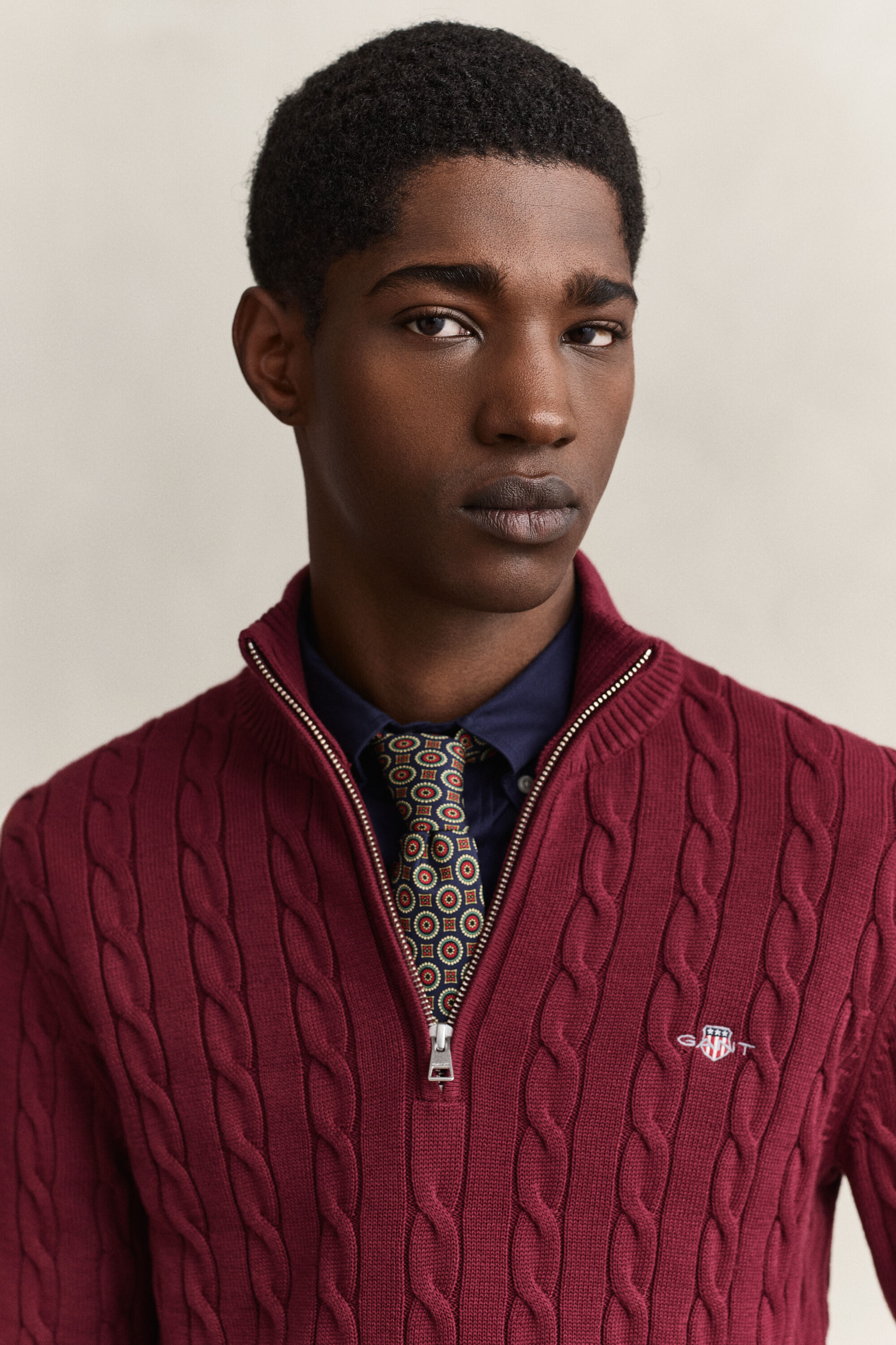 Maglia con zip corta in cotone a trecce