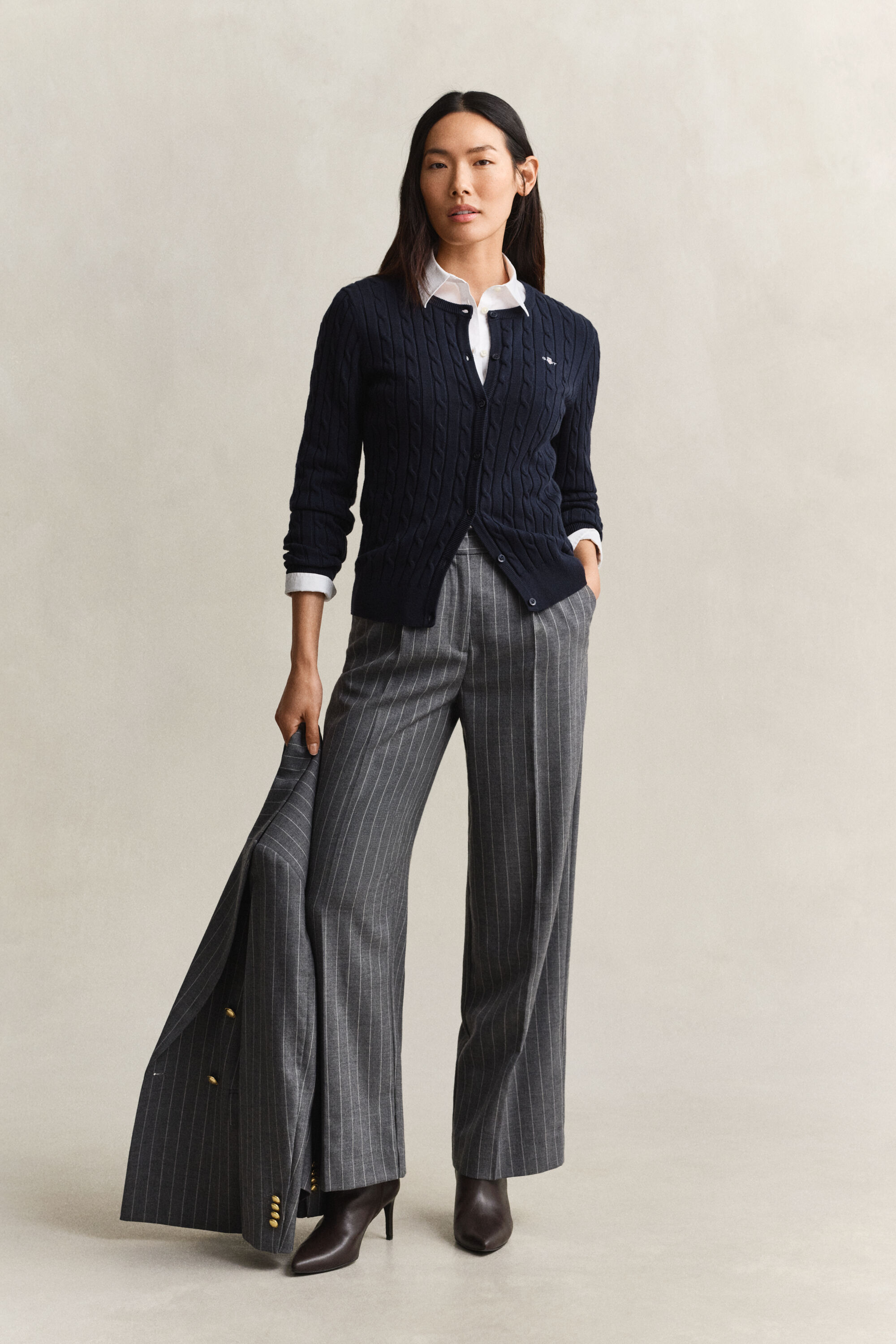 Cardigan in maglia con lavorazione a trecce