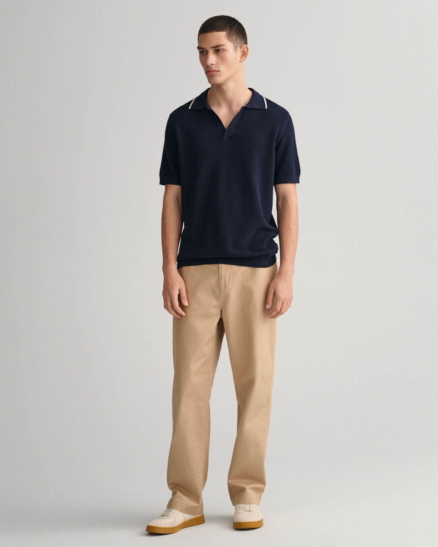 Maglia a polo testurizzata in cotone con colletto aperto