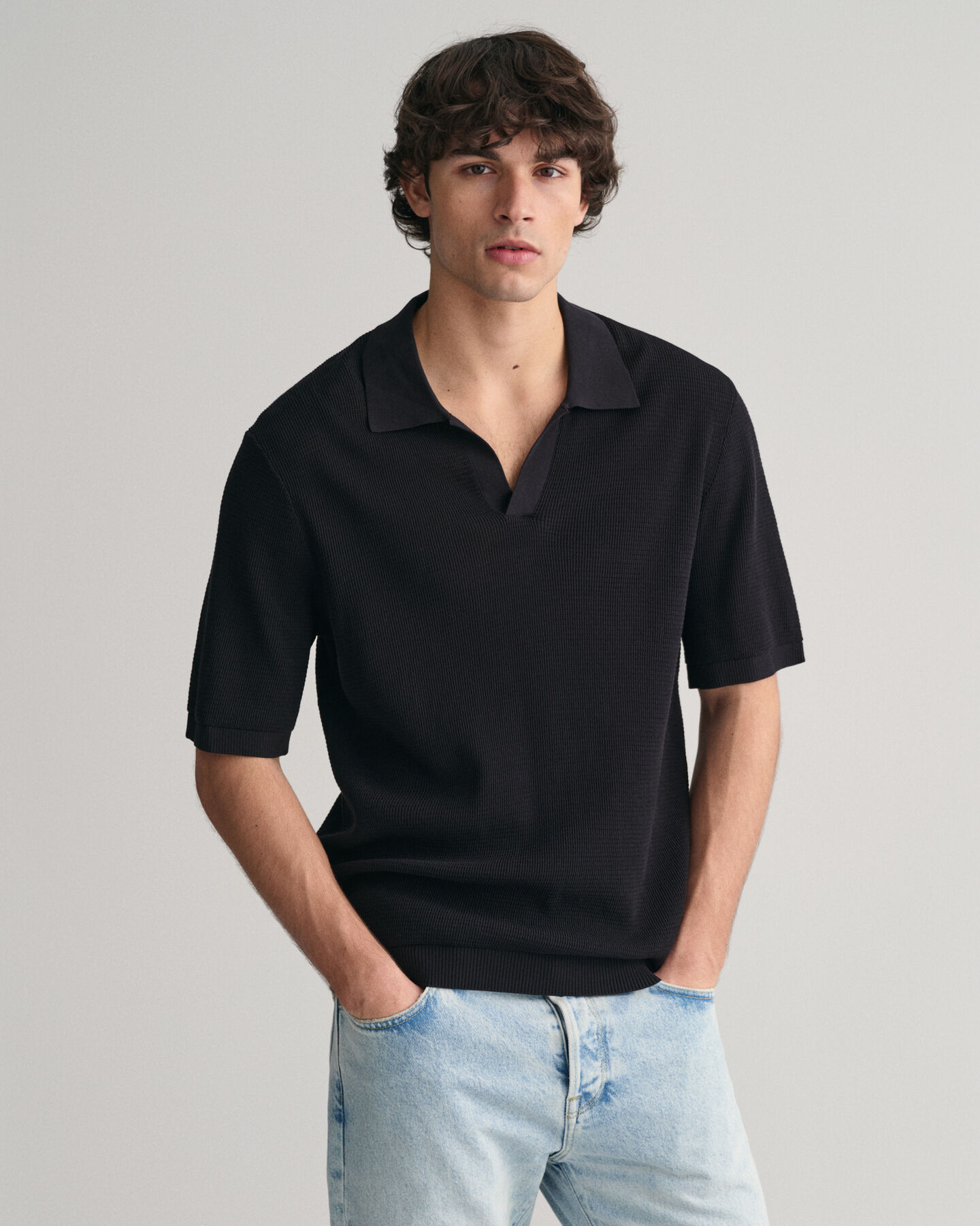 Polo in maglia aperta
