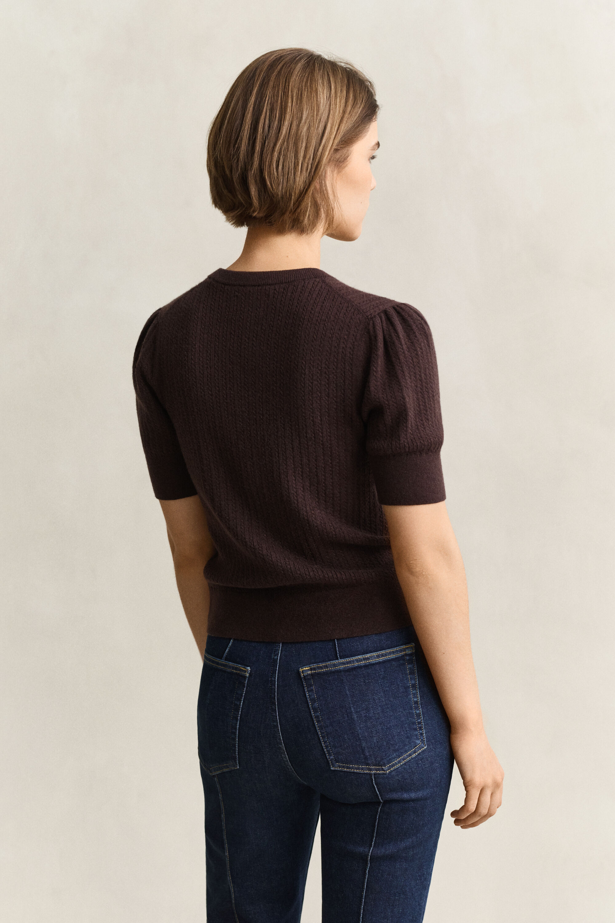 Cardigan a trecce con maniche corte