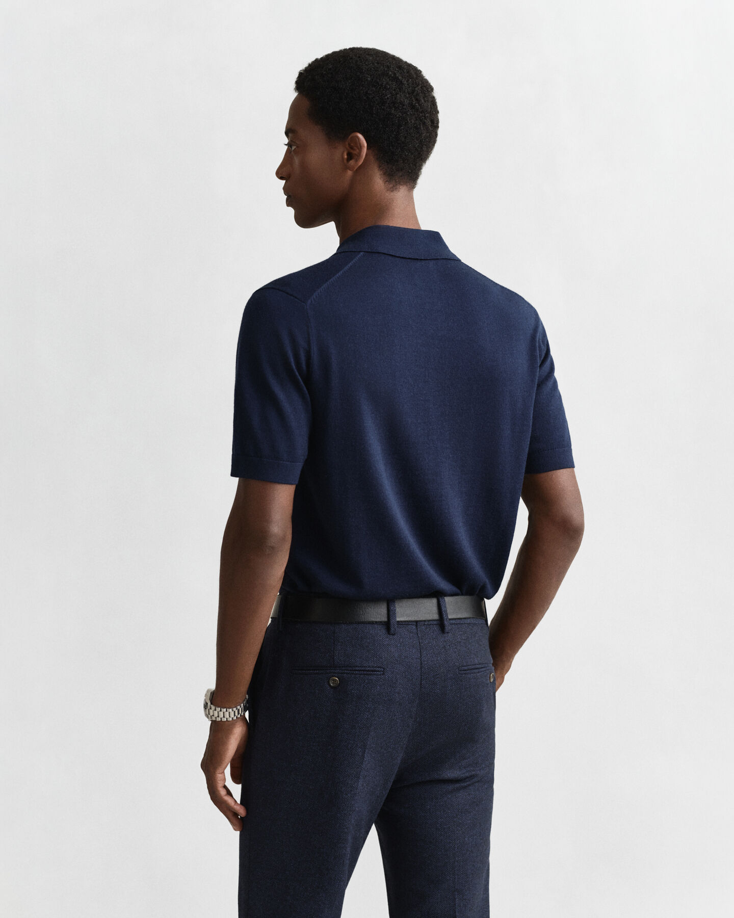 Polo a maniche corte realizzata in pregiata lana merino