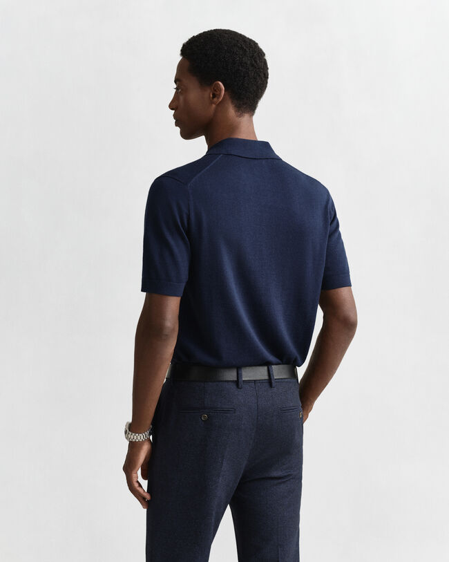 Polo a maniche corte realizzata in pregiata lana merino