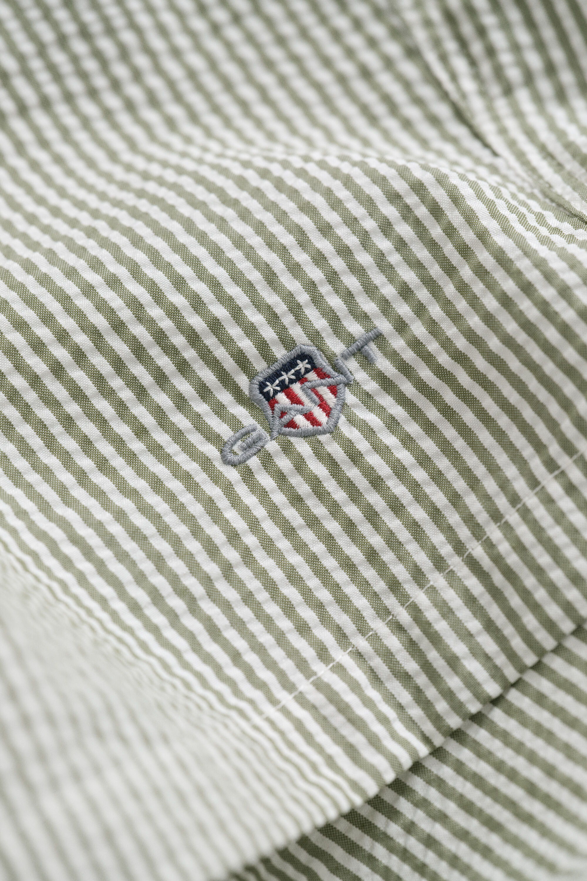 Pantaloncini da bagno in seersucker a righe