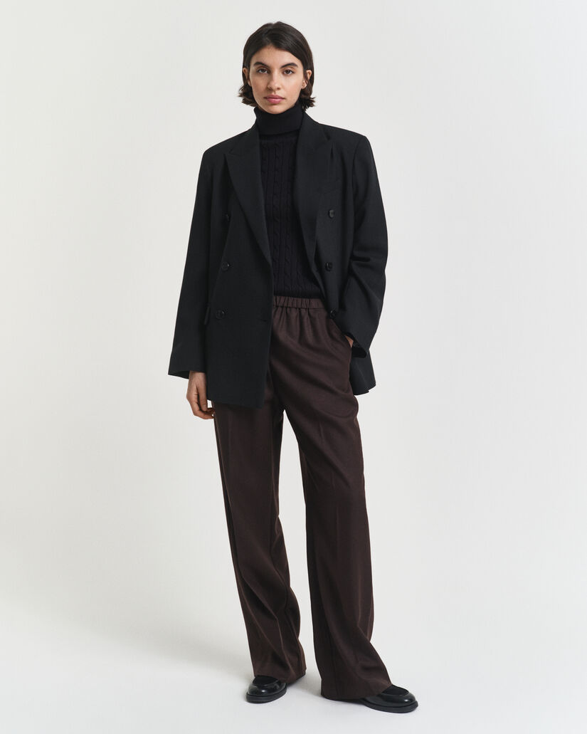 Maglia a collo alto in cotone elasticizzato a trecce