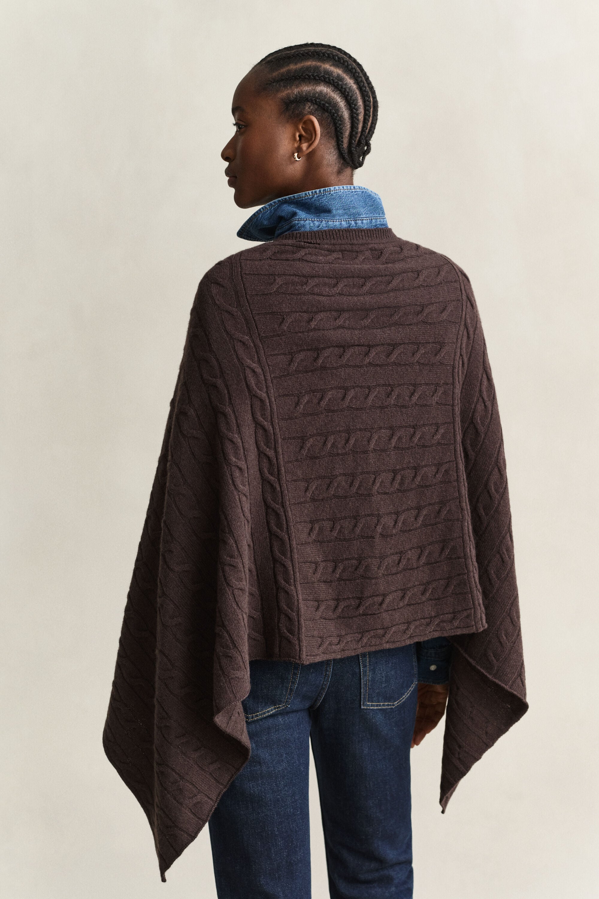 Poncho a trecce in lana