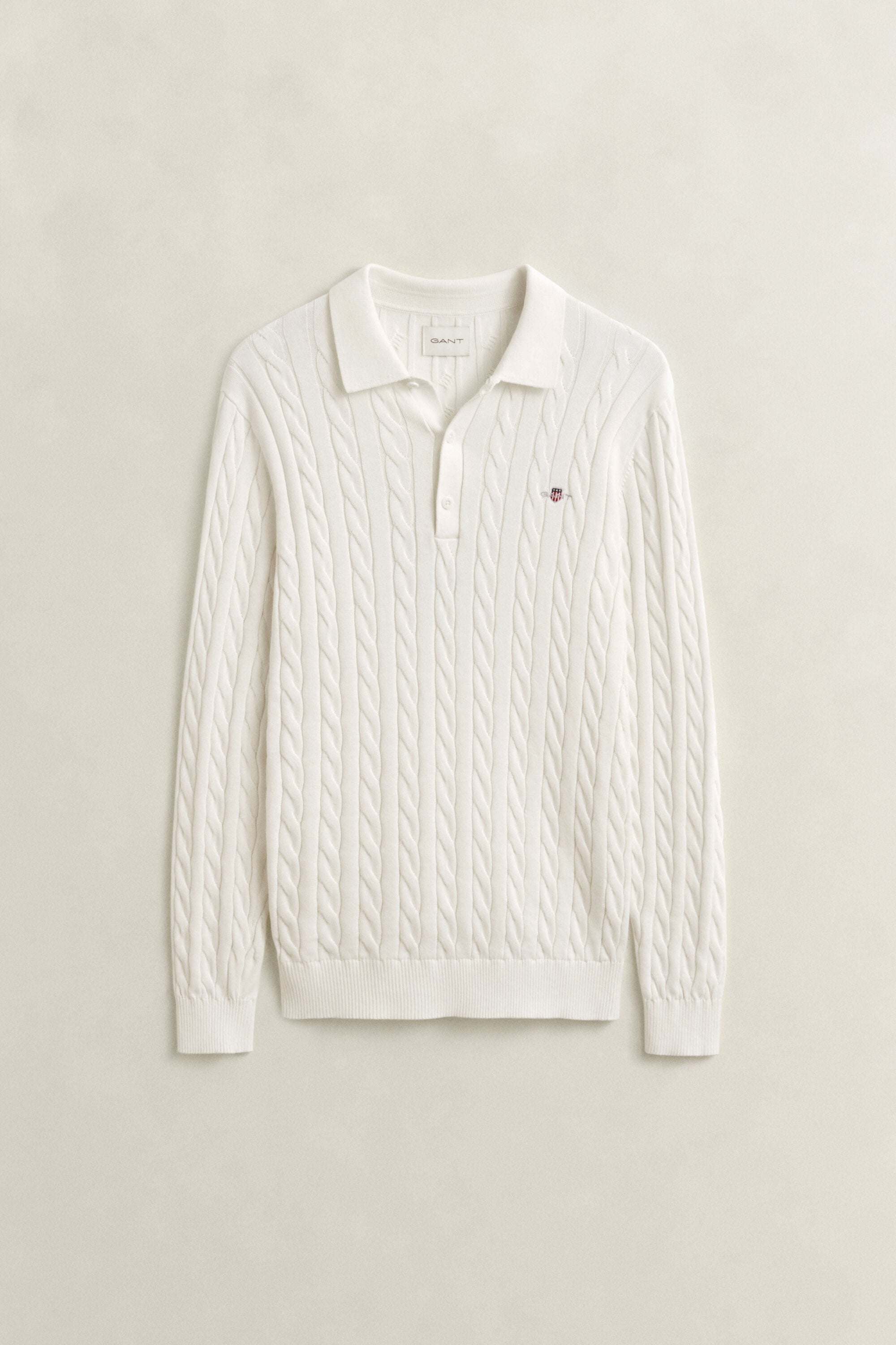 Polo in maglia a trecce in cotone