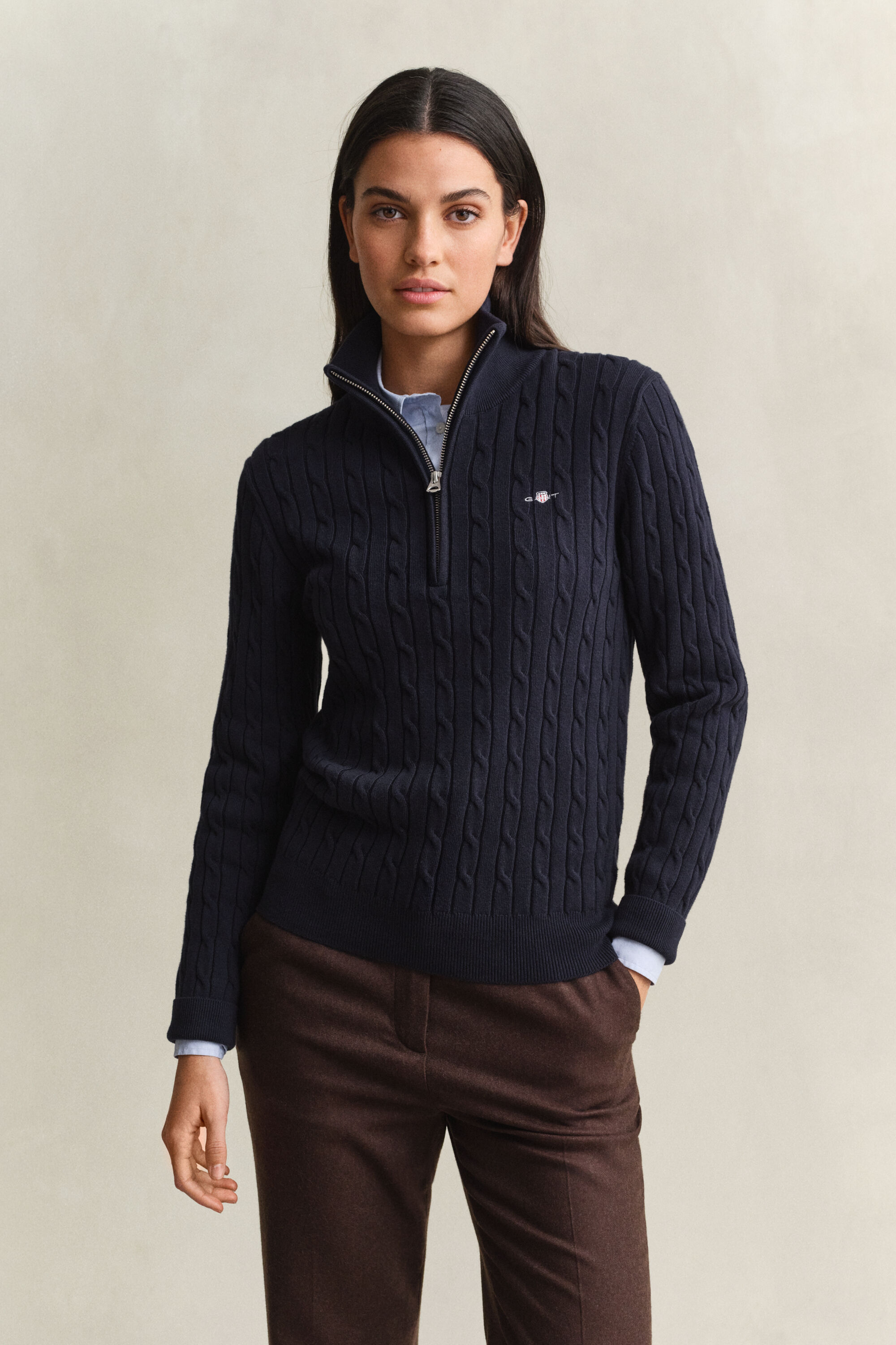 Maglia con zip corta elasticizzata a trecce