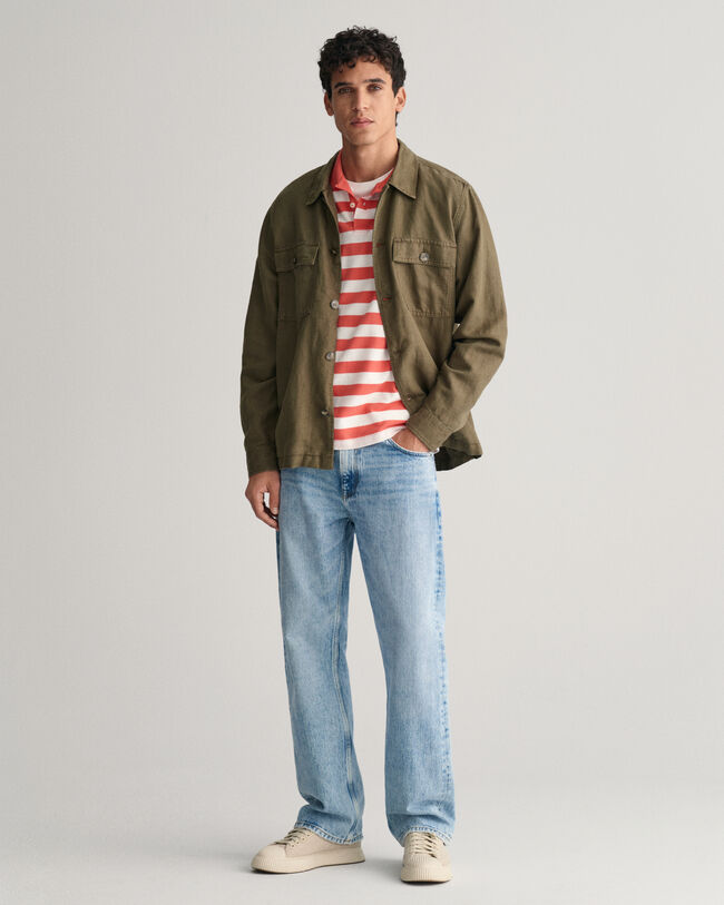 Polo in piqu&eacute; a righe larghe