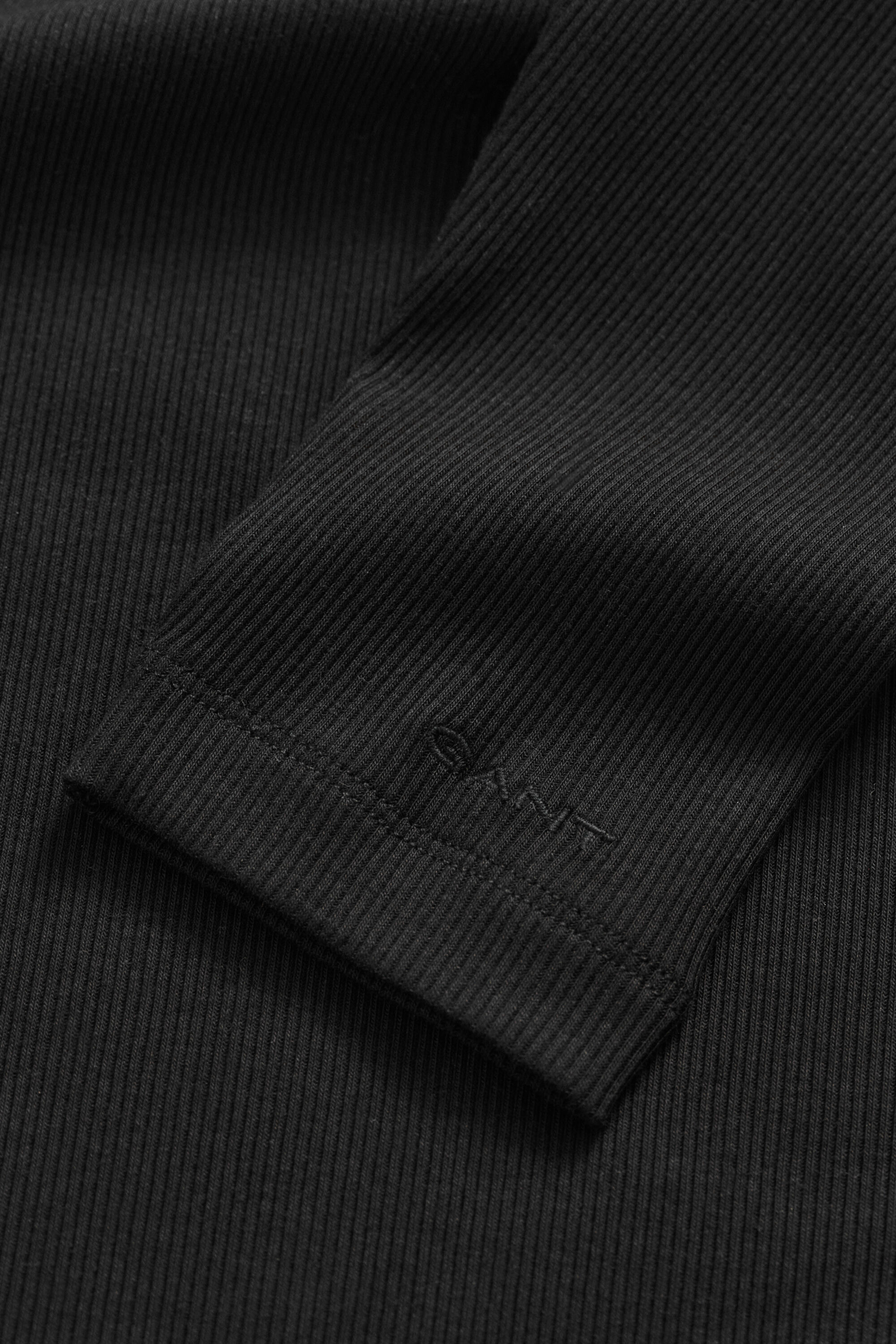 Maglia a collo alto a coste