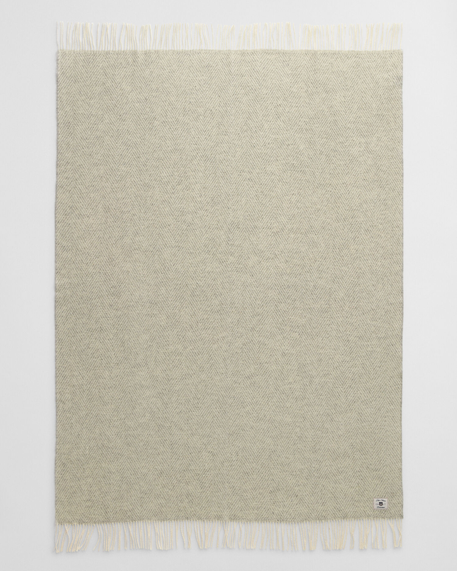 Coperta in lana con motivo a spina di pesce