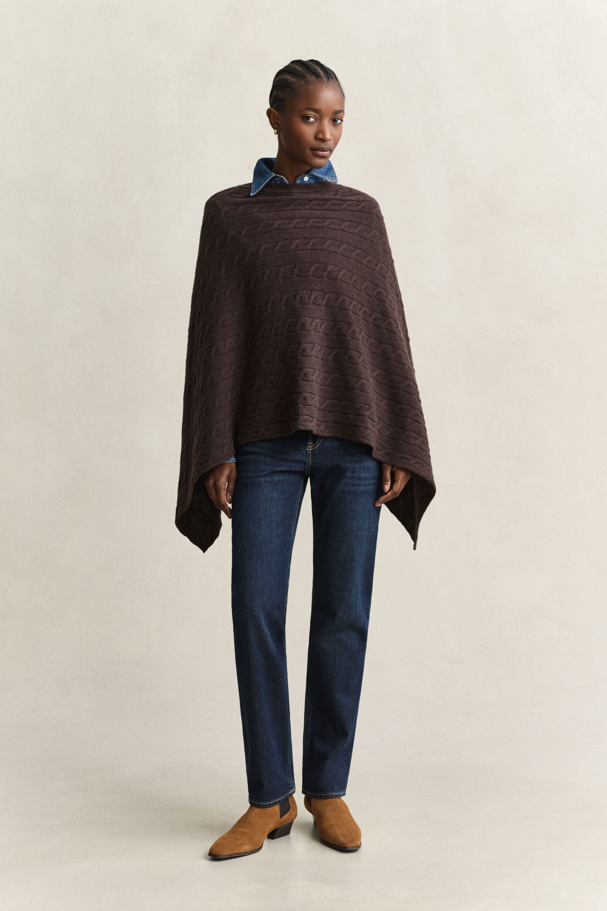 Poncho a trecce in lana
