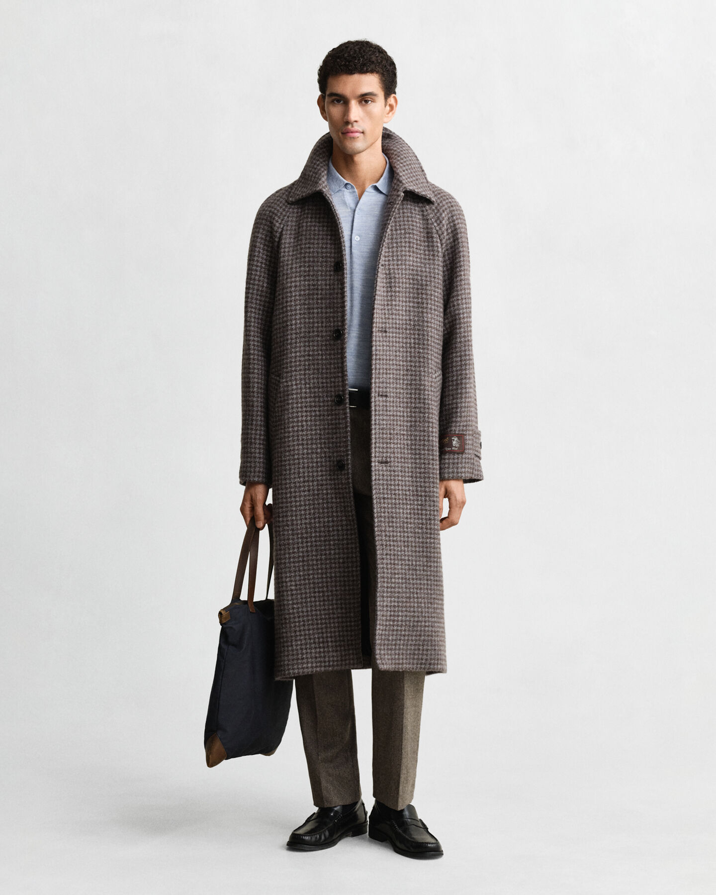 Polo a maniche corte realizzata in pregiata lana merino