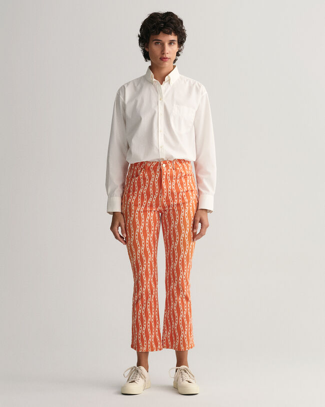 Jeans alla caviglia con stampa a catena