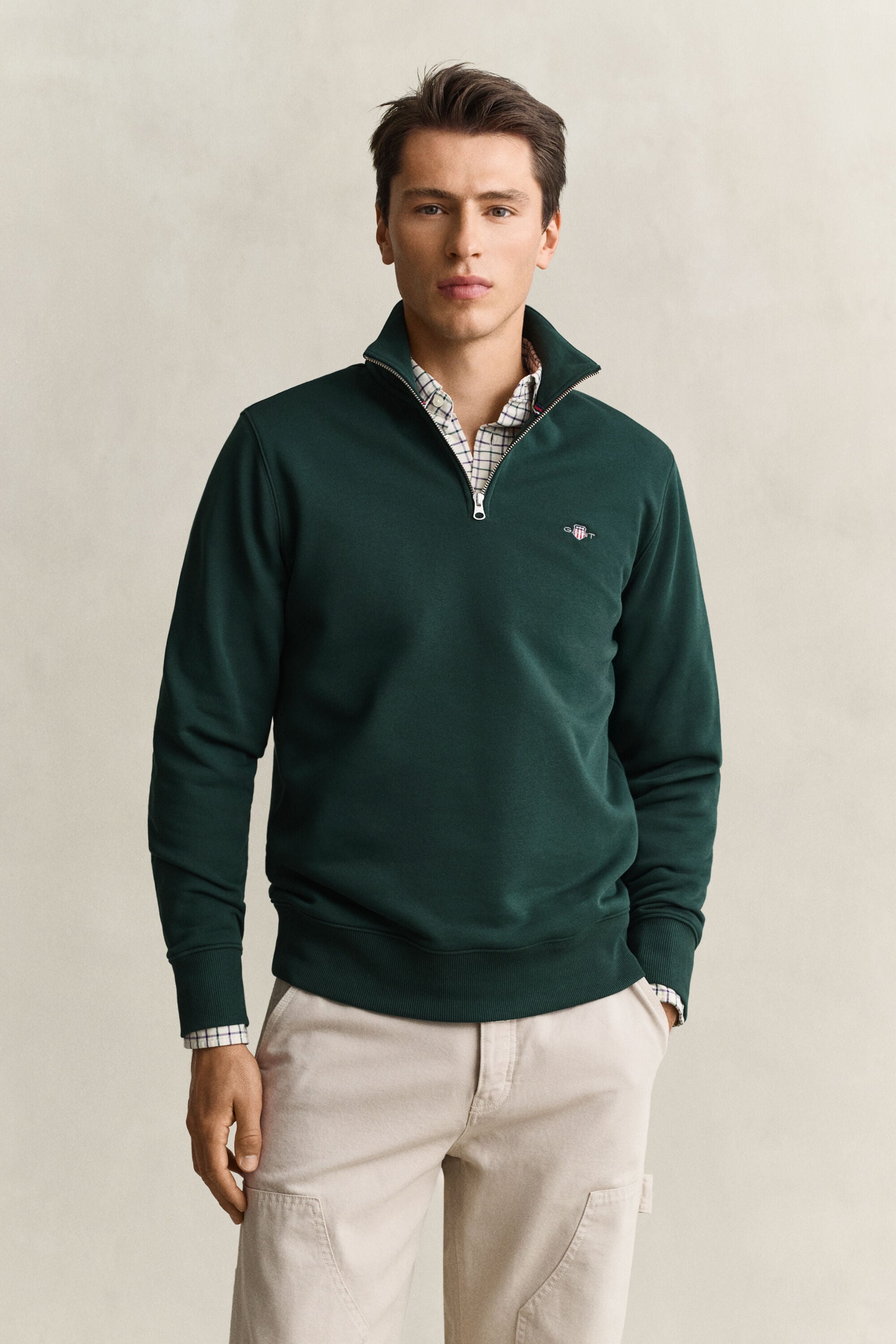 Felpa Shield con zip corta