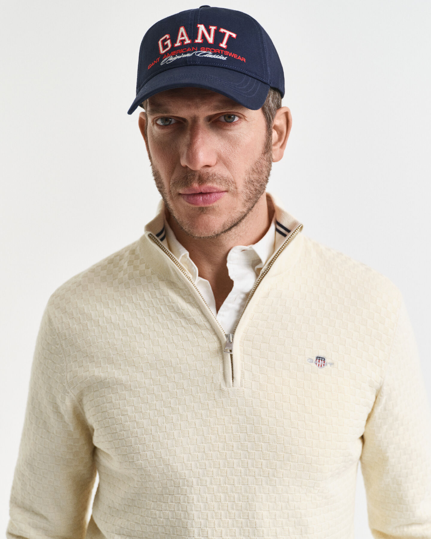 Maglia micro testurizzata con zip corta