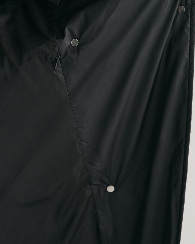 Piumino smanicato trapuntato lungo