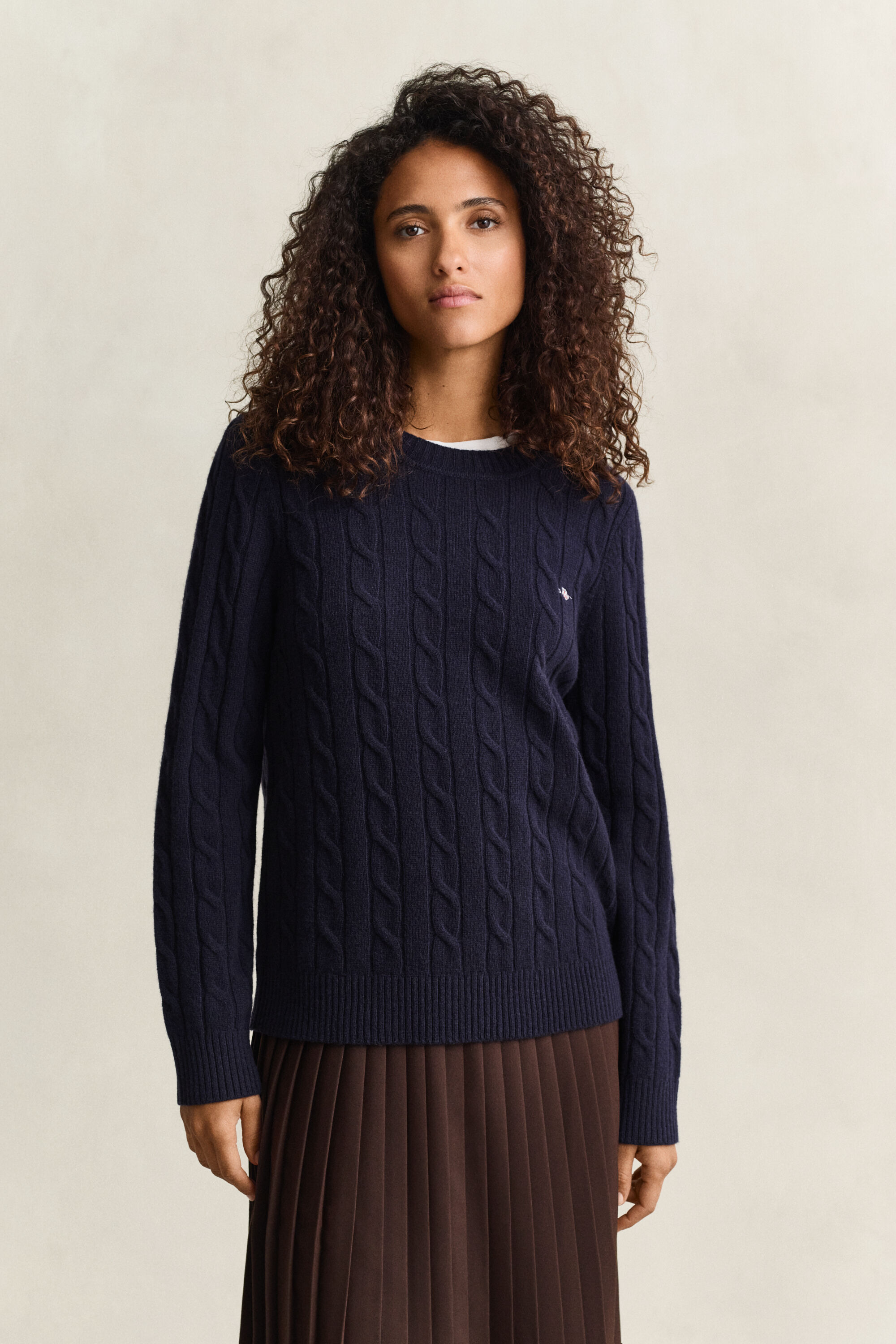 Maglia a trecce in lana d’agnello
